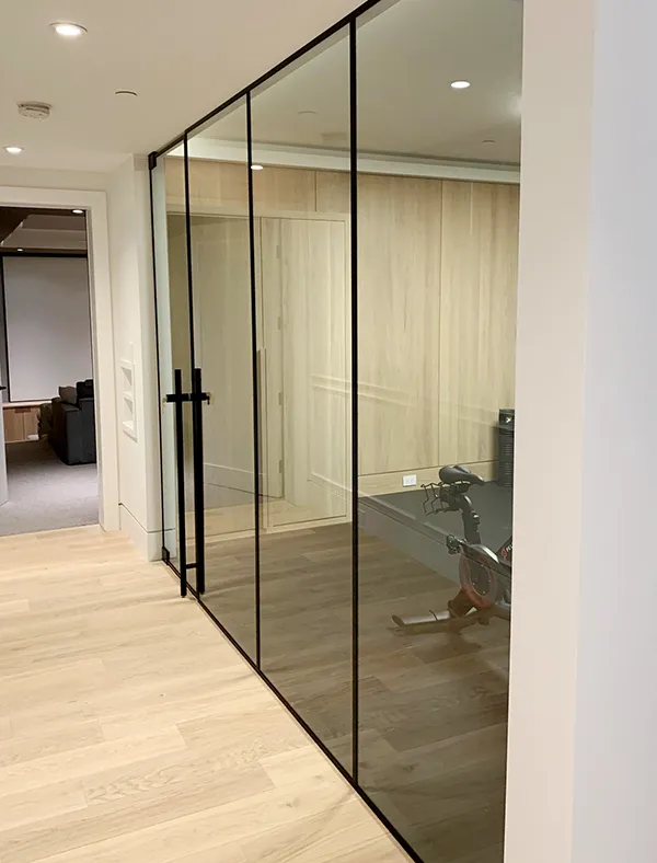 Home gym with glass wall